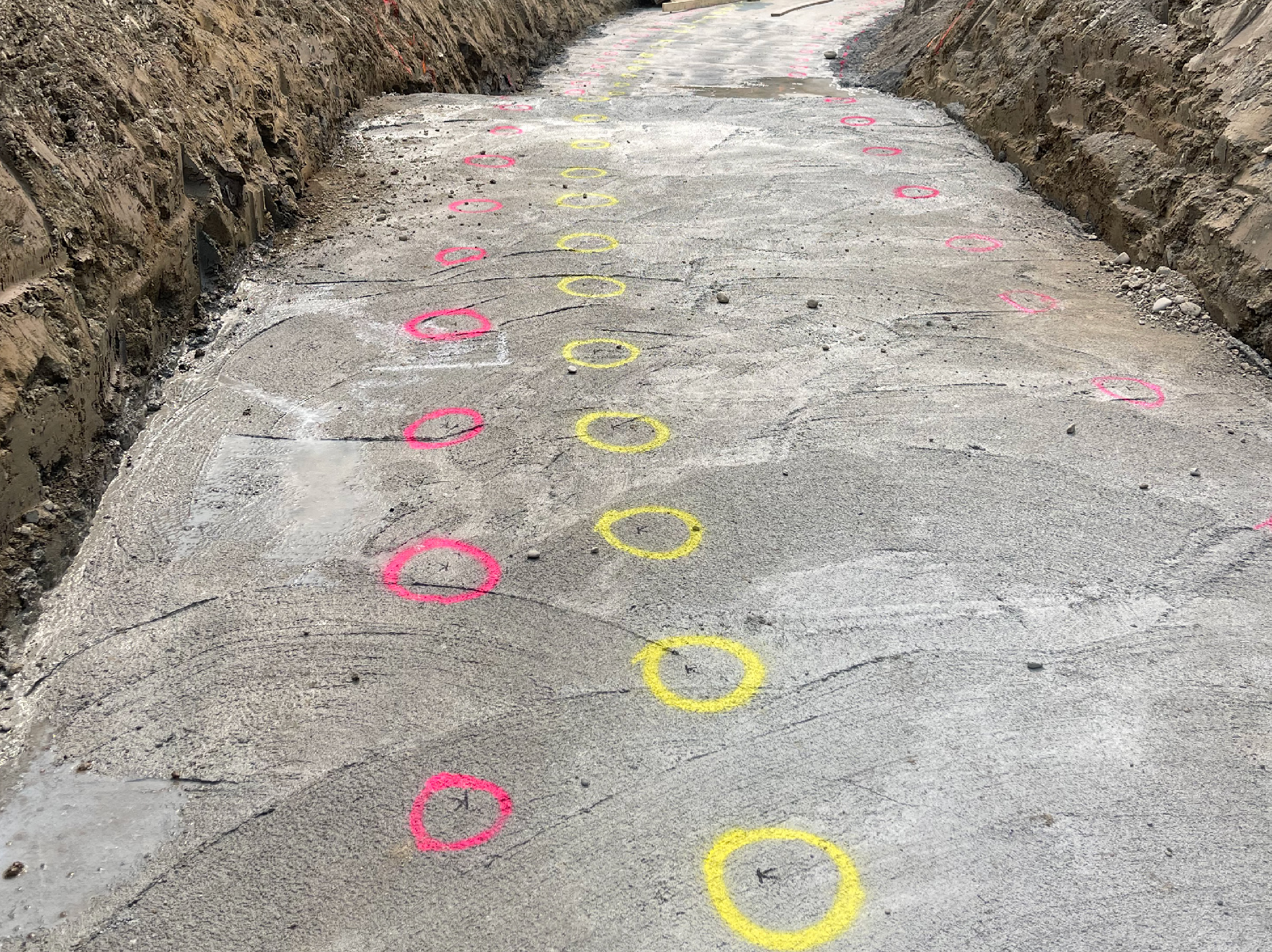 Alberta Construction Surveying footing and foundation layout fpr retaining wall.